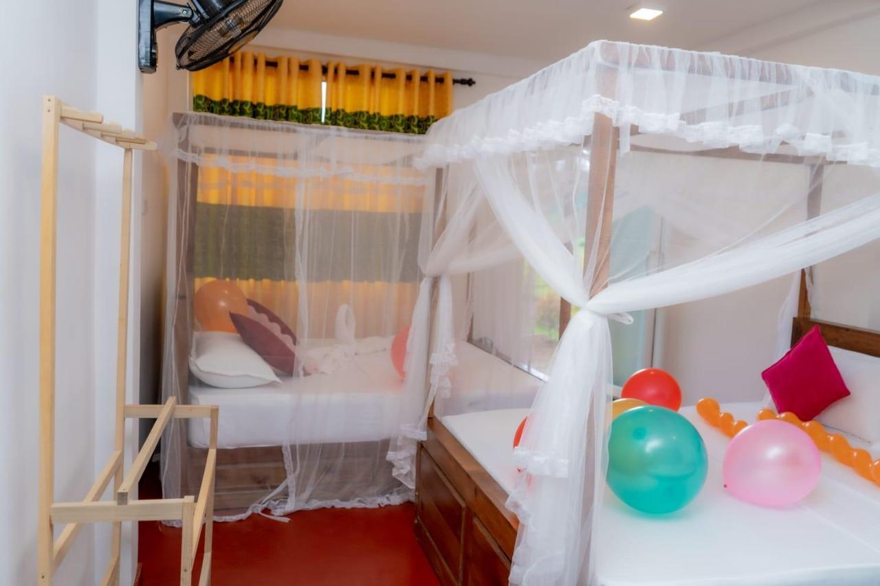 Rainforest Holiday Inn Денияйя Экстерьер фото