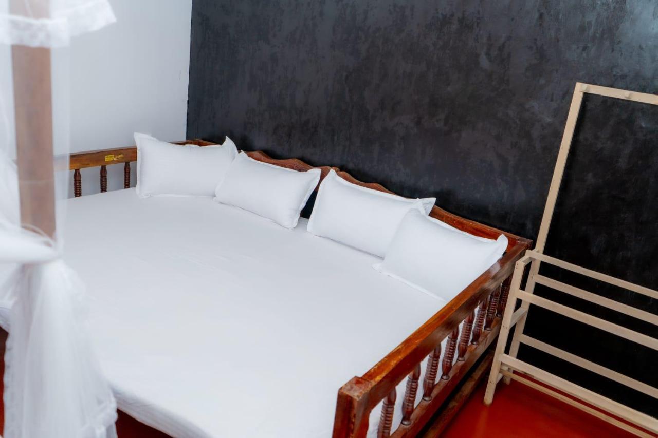 Rainforest Holiday Inn Денияйя Экстерьер фото