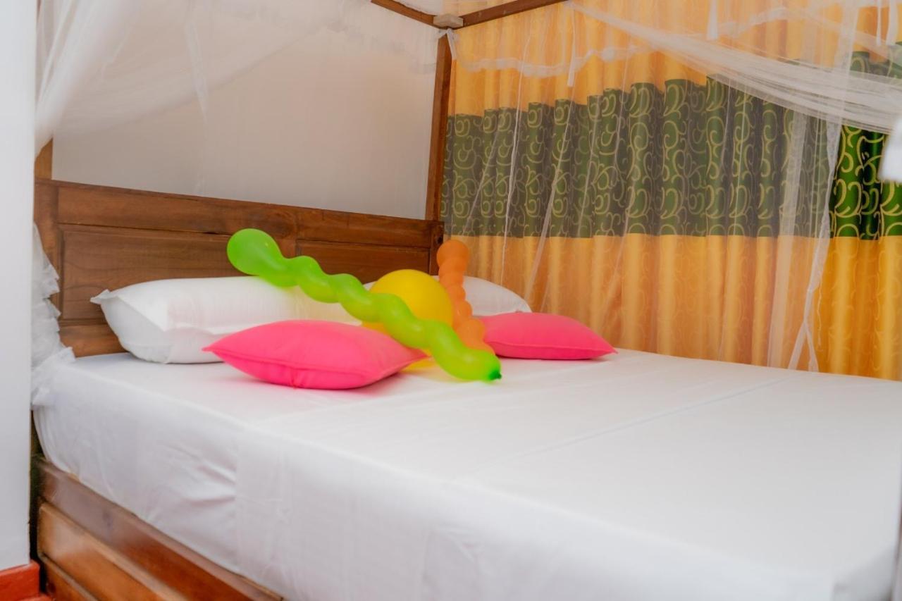 Rainforest Holiday Inn Денияйя Экстерьер фото