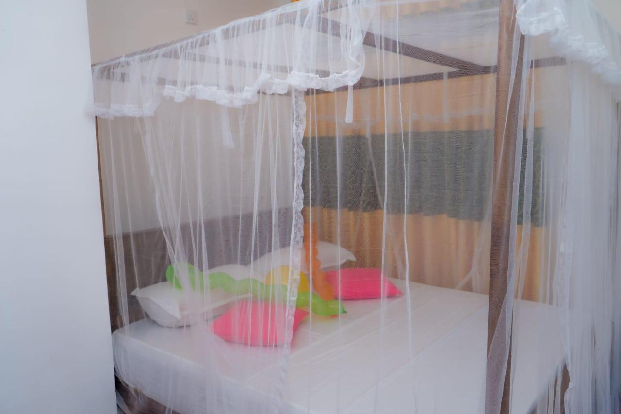 Rainforest Holiday Inn Денияйя Экстерьер фото