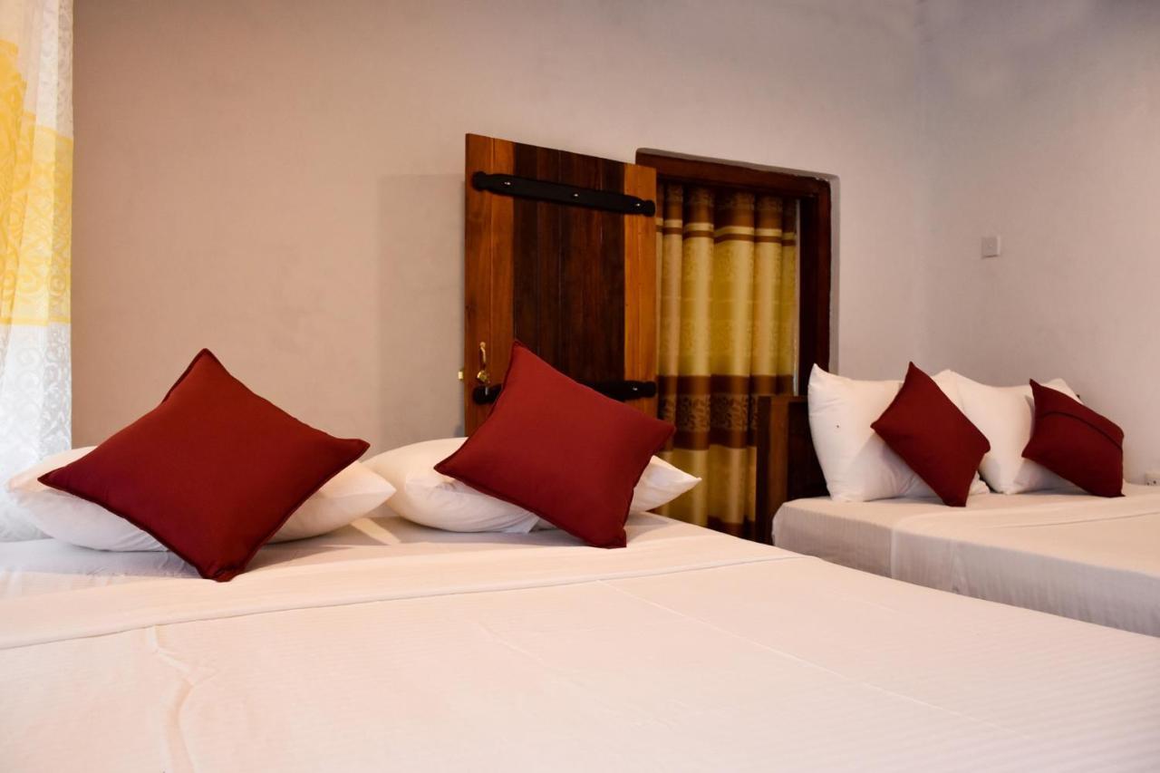 Rainforest Holiday Inn Денияйя Экстерьер фото