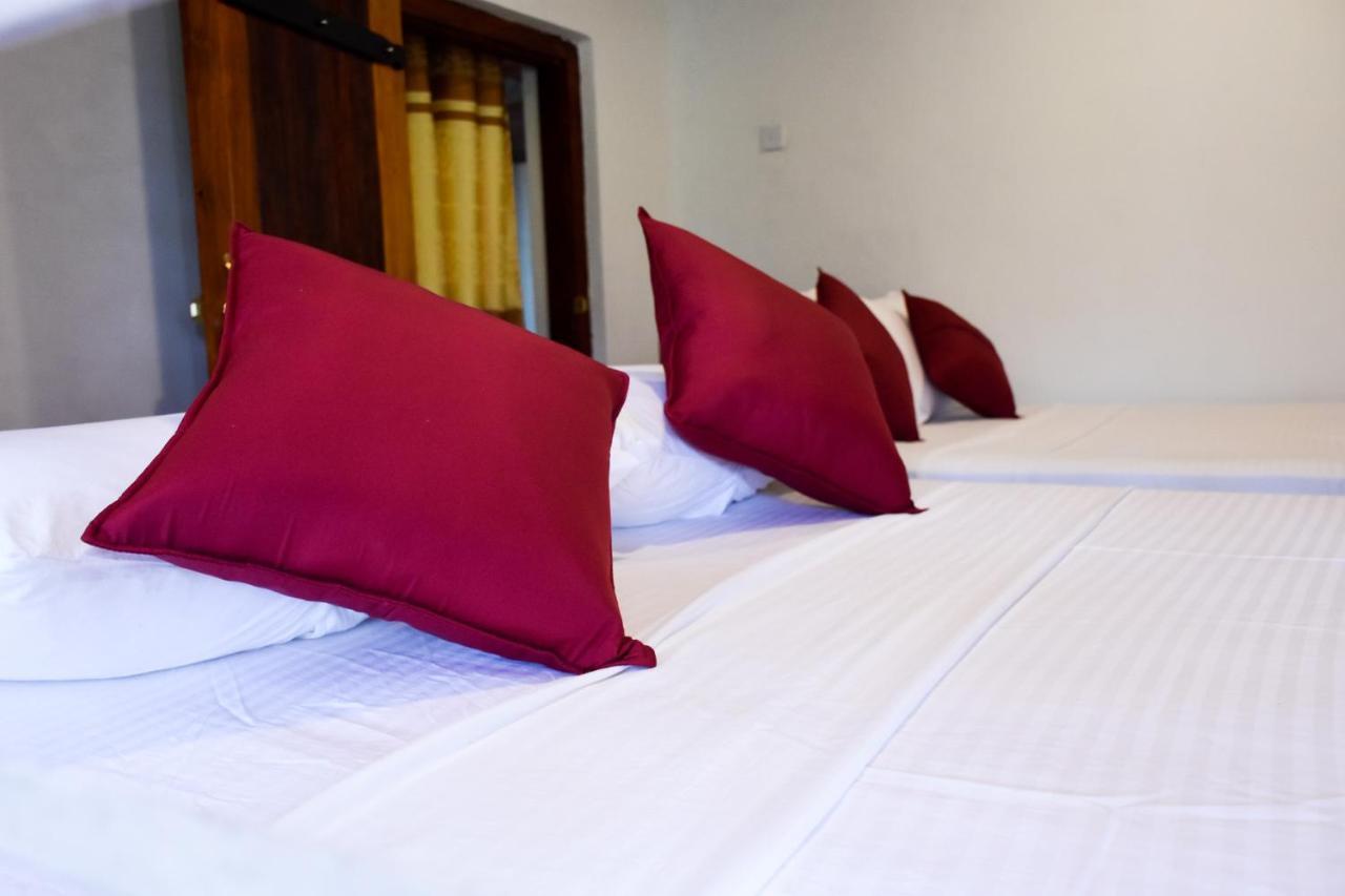 Rainforest Holiday Inn Денияйя Экстерьер фото
