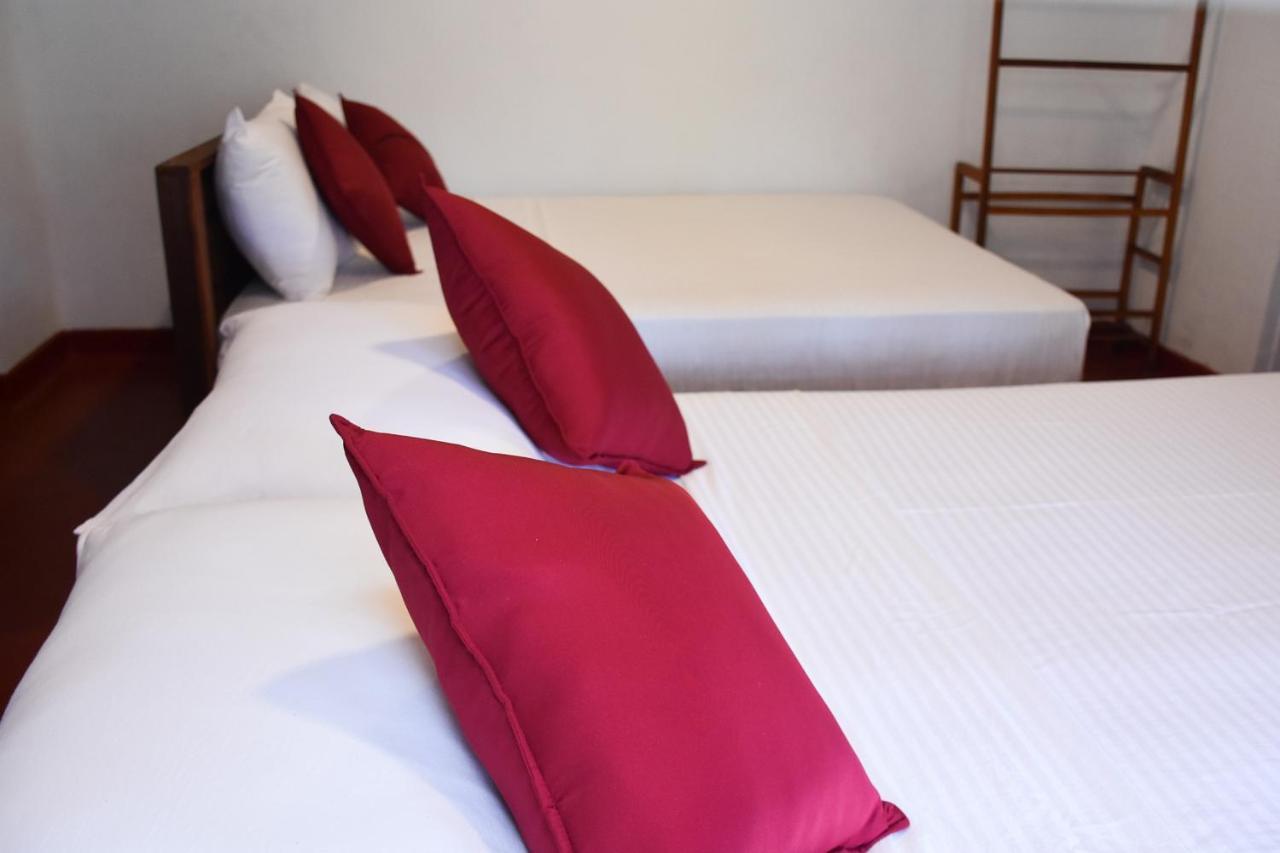 Rainforest Holiday Inn Денияйя Экстерьер фото