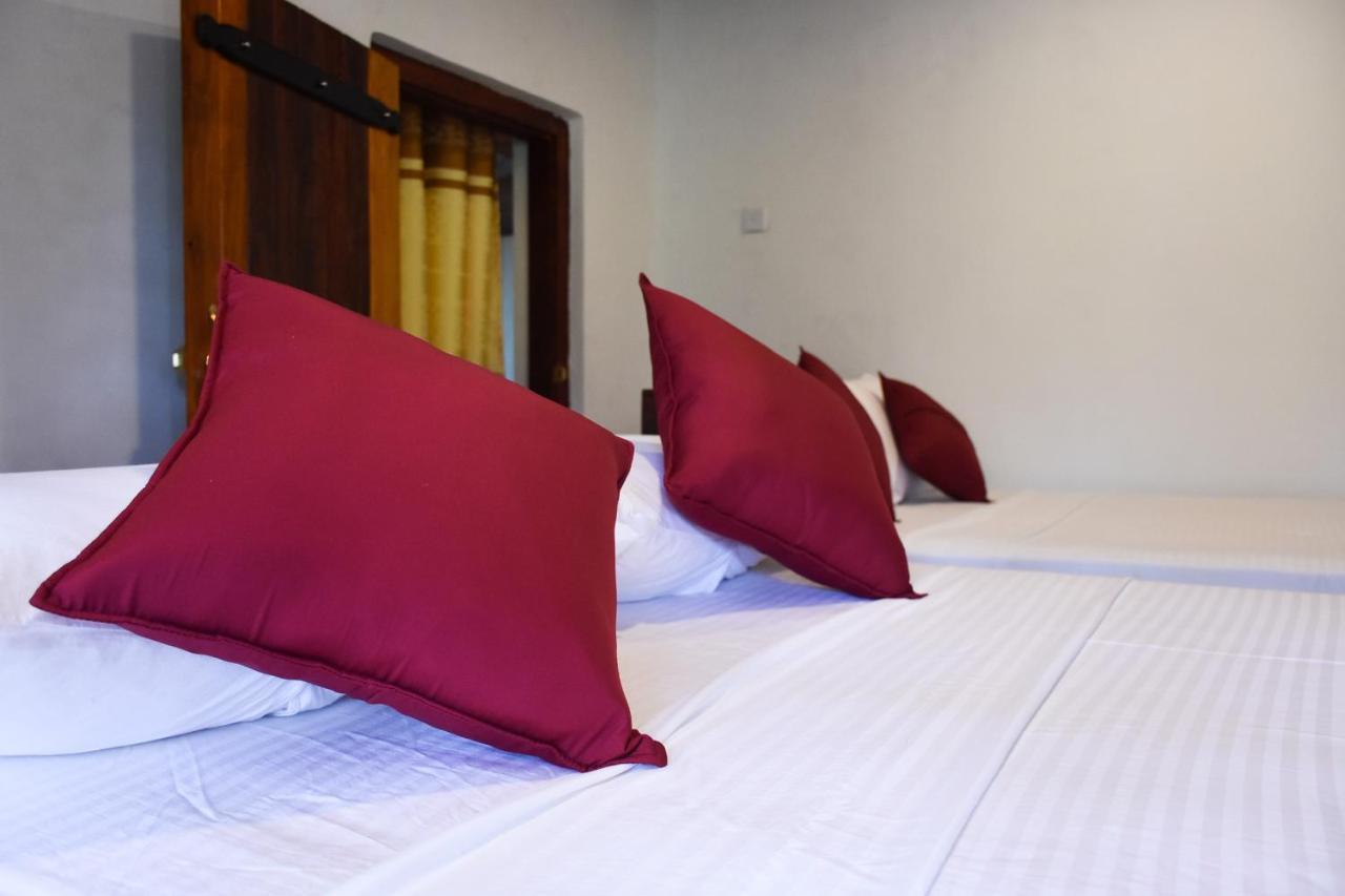 Rainforest Holiday Inn Денияйя Экстерьер фото